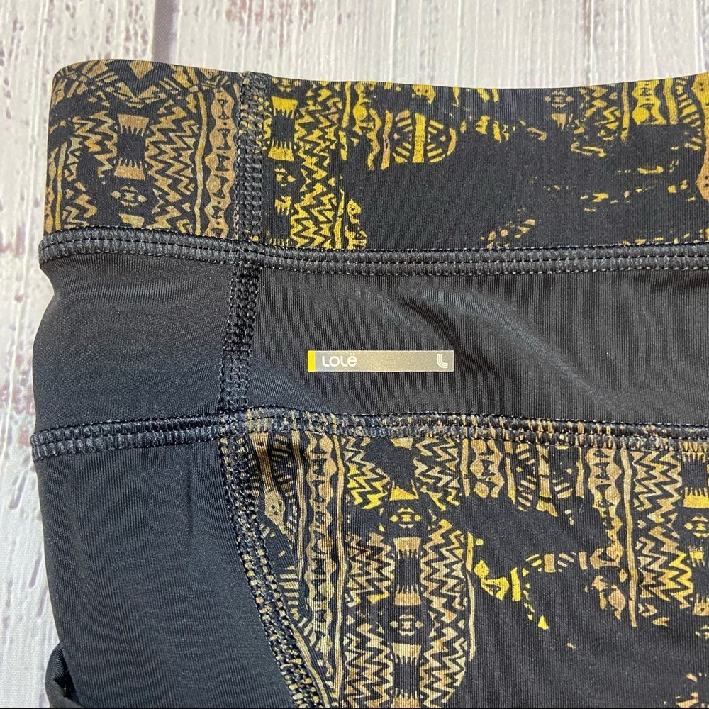 Lole Burst Black and Gold Print Ankle Leggings. Size Small. EUC - Picture 4 of 13